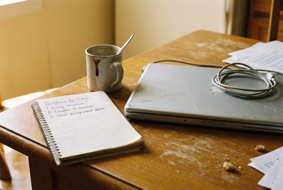 Parent's notepad with questions to ask before contacting a tutor, ready for a free consult call with Lily's Tutoring Services